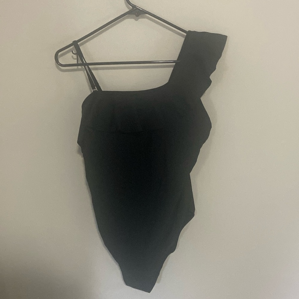 One piece swimsuit in black. Size medium.